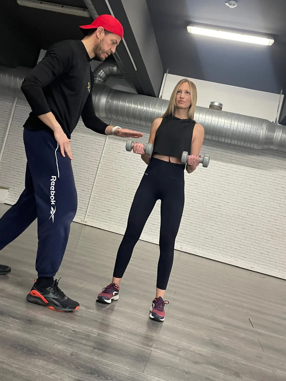 Séance de coaching personnalisé aux haltères chez Victory Fit